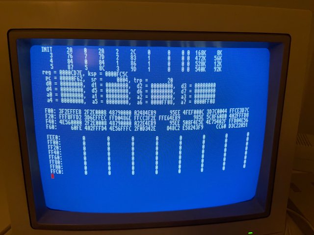 Photo of CRT monitor displaying a Minix Memory Dump
